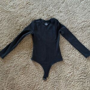 Nuuds black bodysuit.